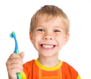 boy cleans a teeth
